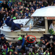 Illustration for article titled Marshawn Lynch Reaches For A Bottle Of Fireball At The Seahawks Parade